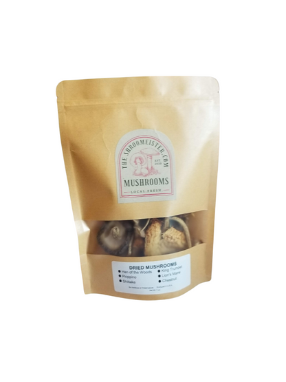 A package of dried mixed premium mushrooms, including various types such as Lion's Mane, Shiitake, and King Trumpet, resealable craft paper bag.